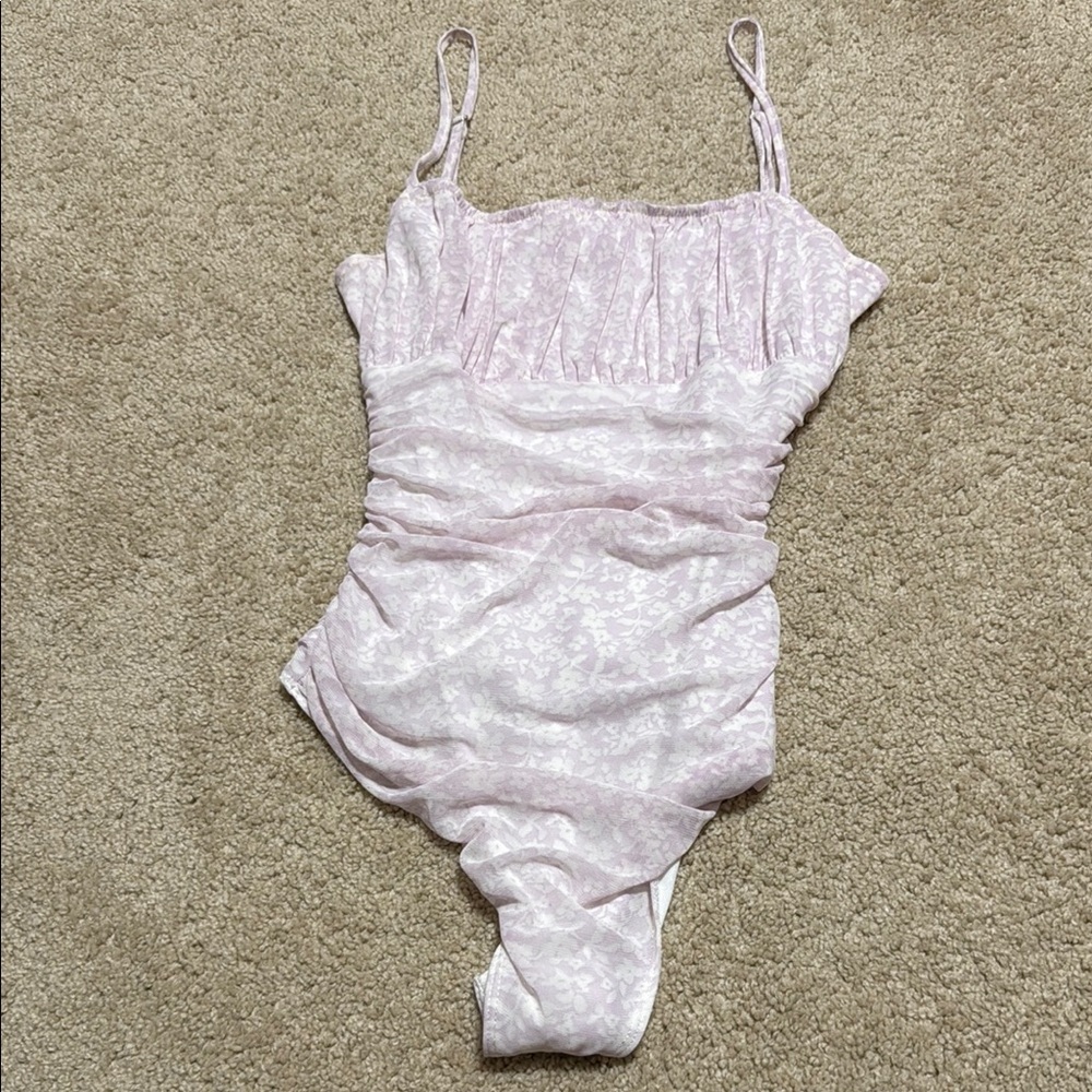 Women’s Pink and white body suit